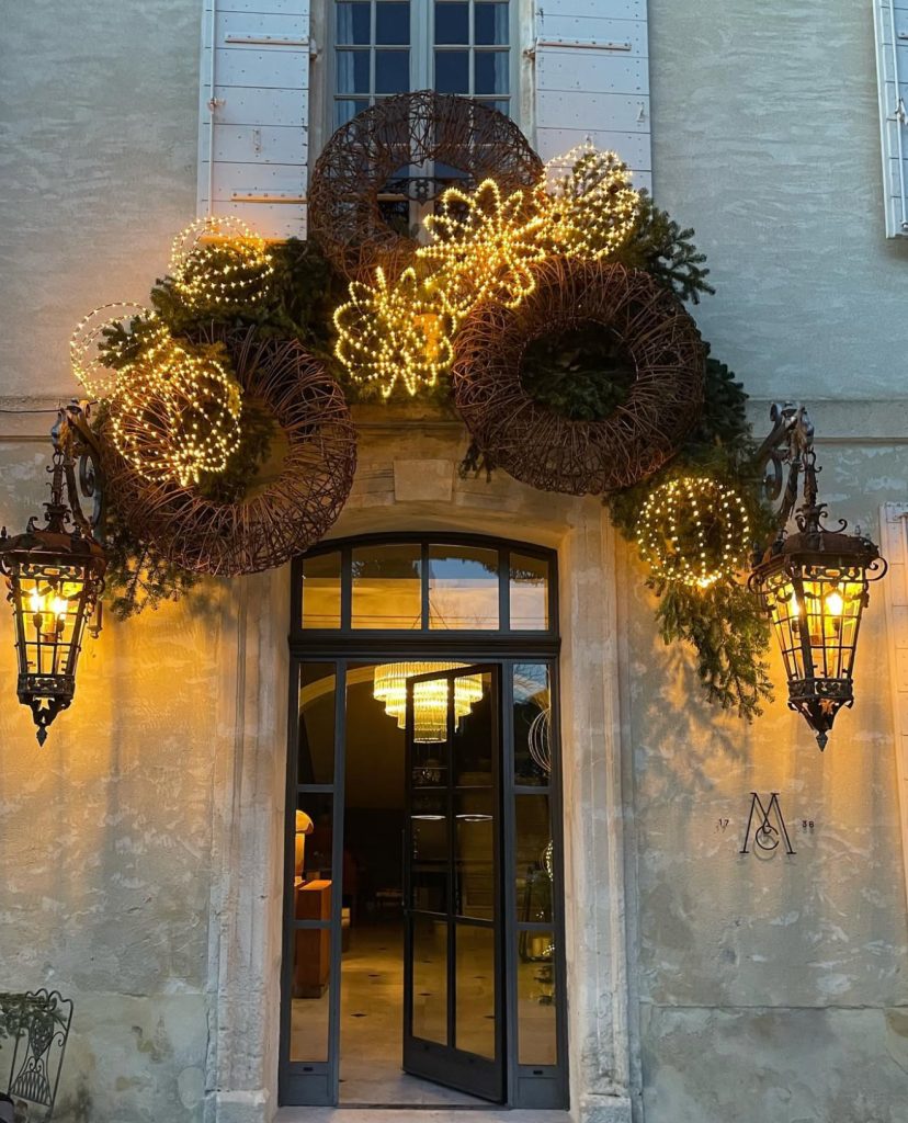 Artistic light display above door