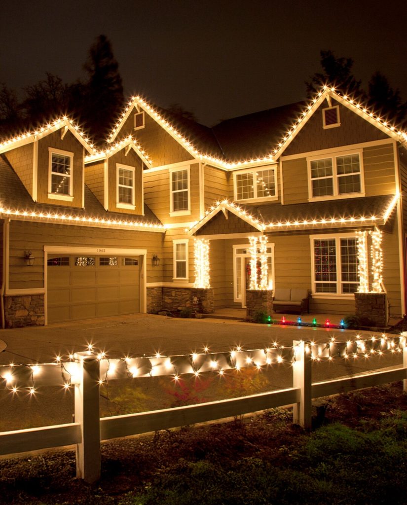 House outlined with golden lights