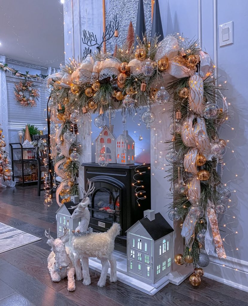 Festive fireplace decorated with gold and silver ornaments
