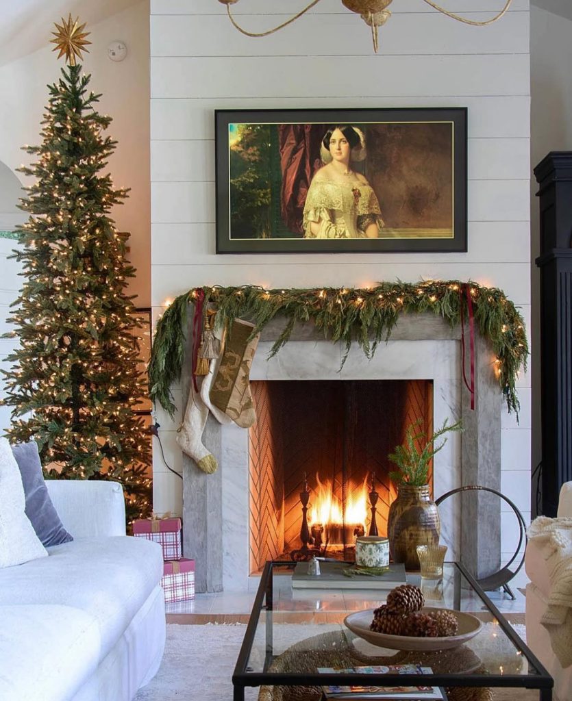 Classic Christmas fireplace with golden star tree
