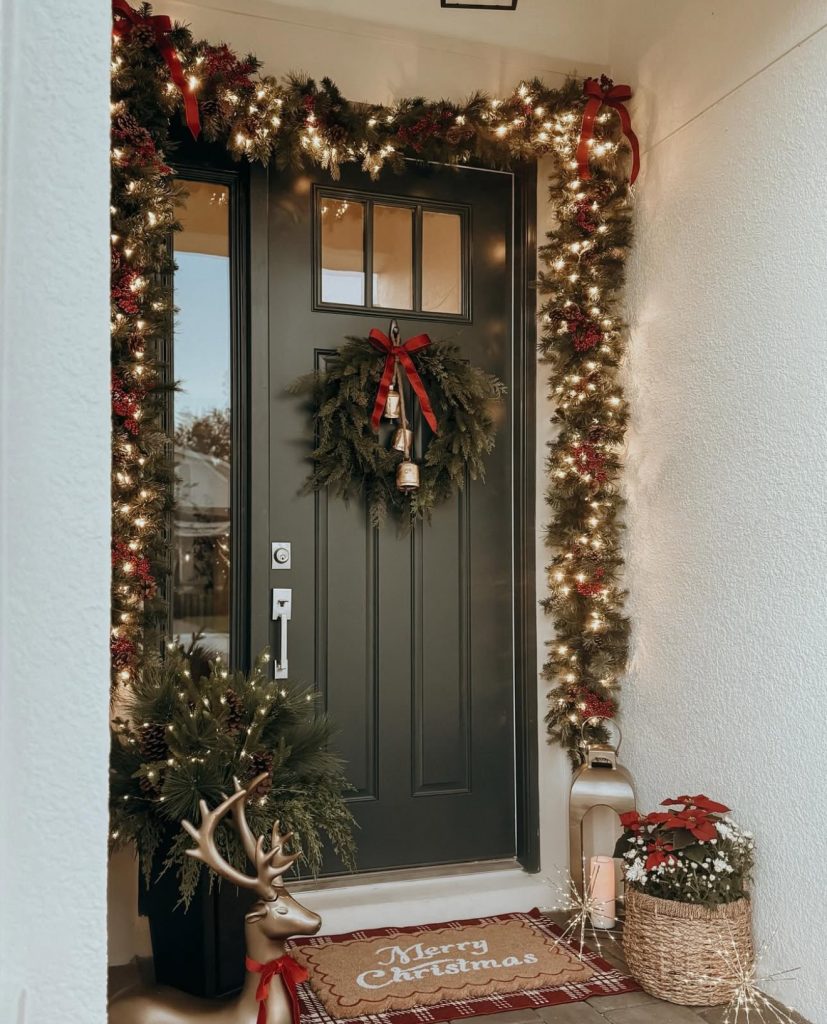 Elegant front porch with garland and lights