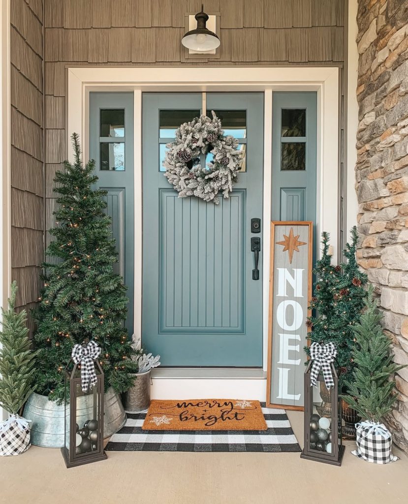 Farmhouse porch with frosted wreath and plaid ribbons