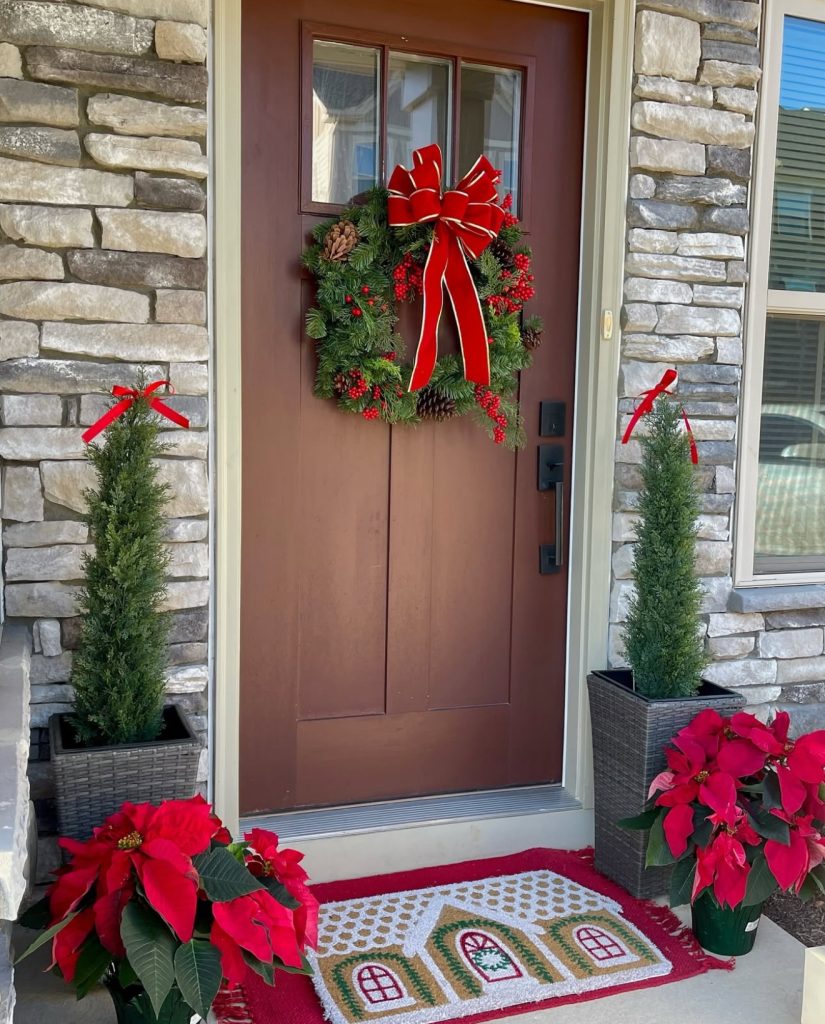 Traditional red and green Christmas porch