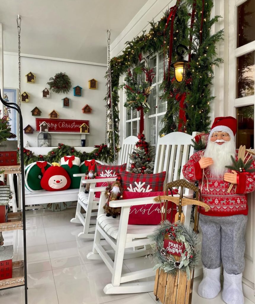 Porch with rocking chairs and Christmas decor