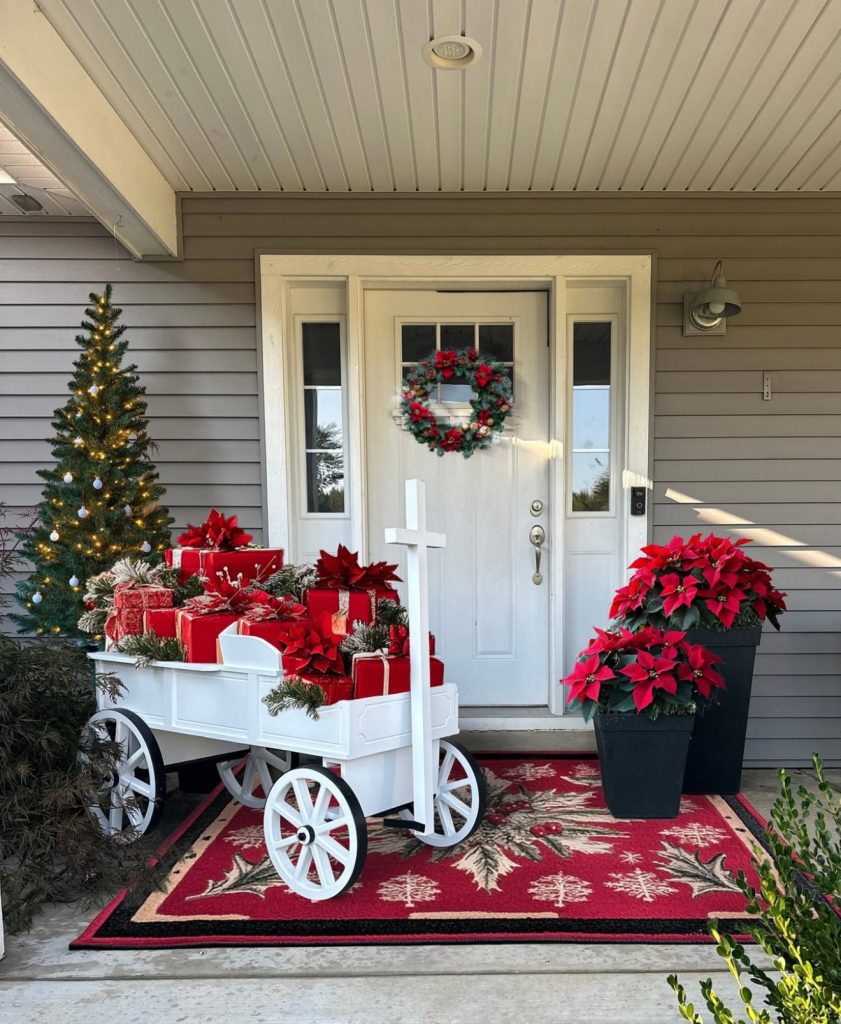 Christmas porch with wagon full of presents