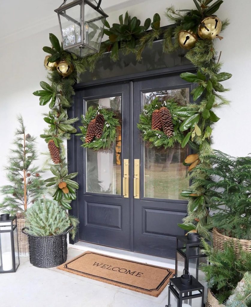 Christmas porch with large pinecones and magnolia leaves
