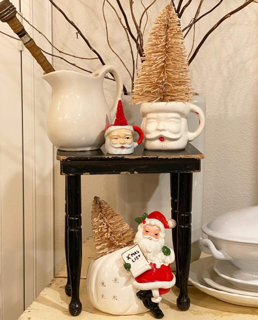 Santa Figurines and Bottle Brush Trees