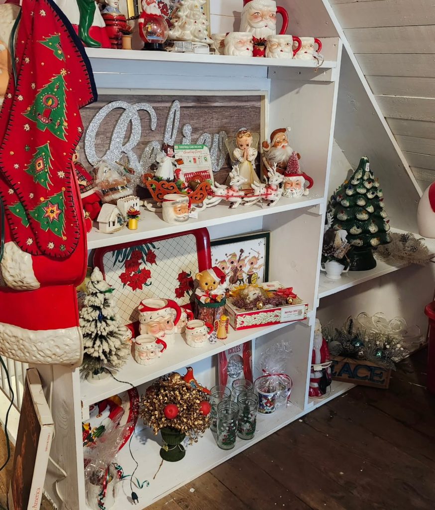 Shelf of Vintage Santas and Collectibles