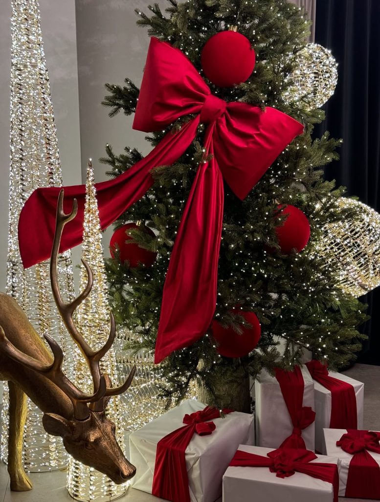 Christmas tree with large red bow