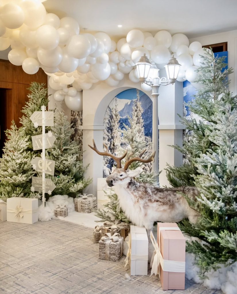 Woodland winter scene with reindeer