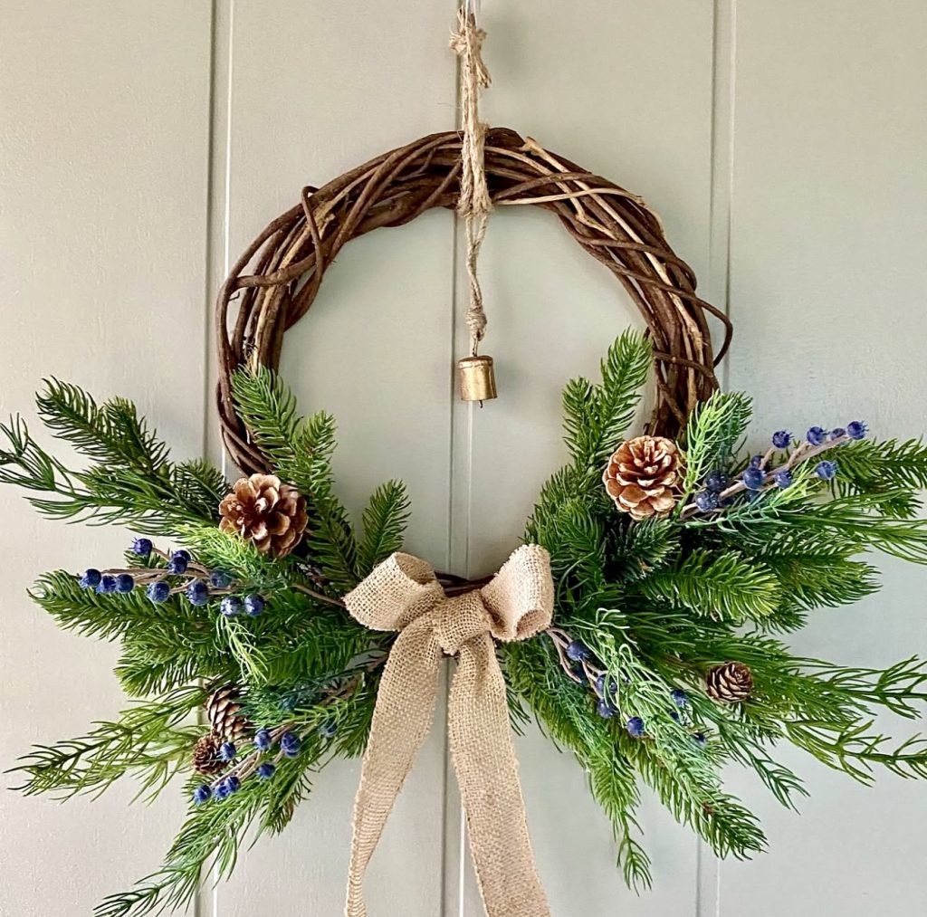 Grapevine wreath with blue berries