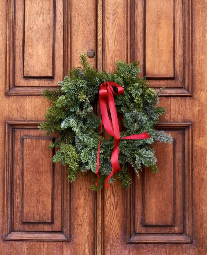 Simple evergreen wreath with red bow