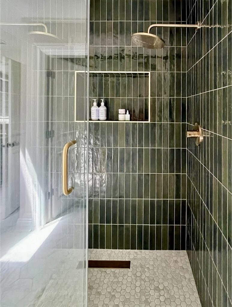 Deep Green Shower Tiles with Brass Fixtures