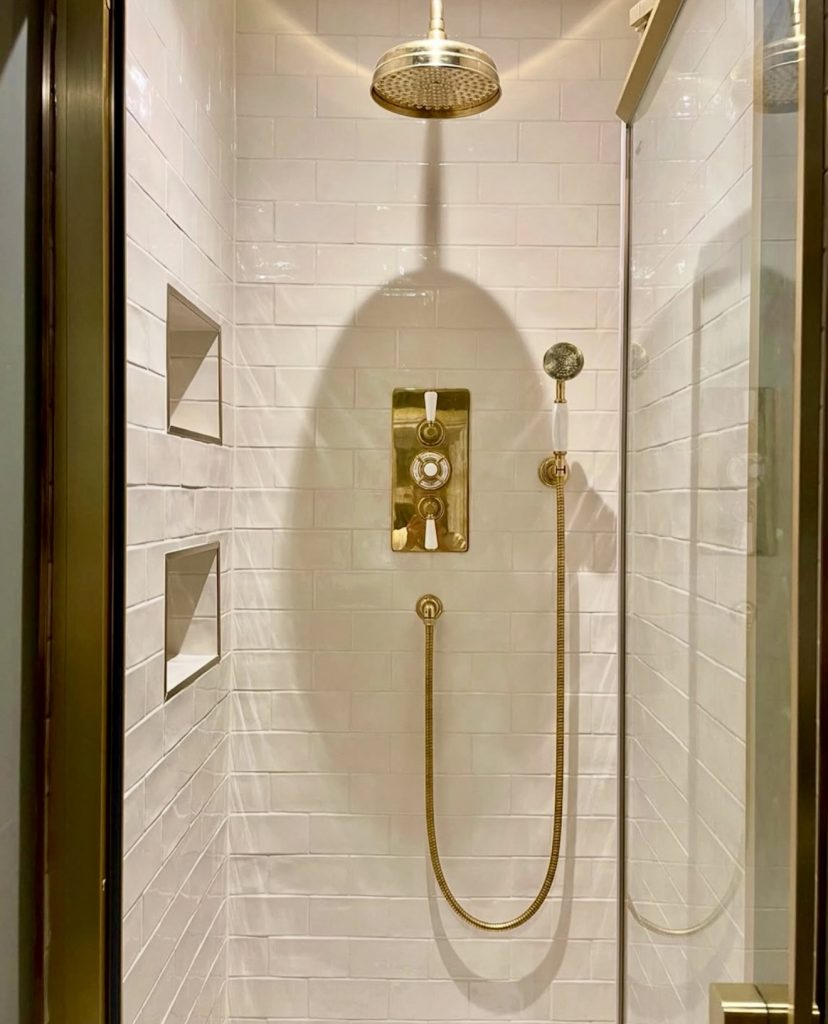 White Subway Tiles with Gold Fixtures