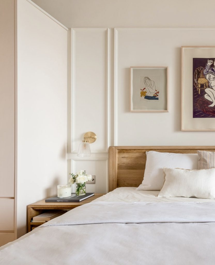 Bedroom with wooden furniture and brass accents