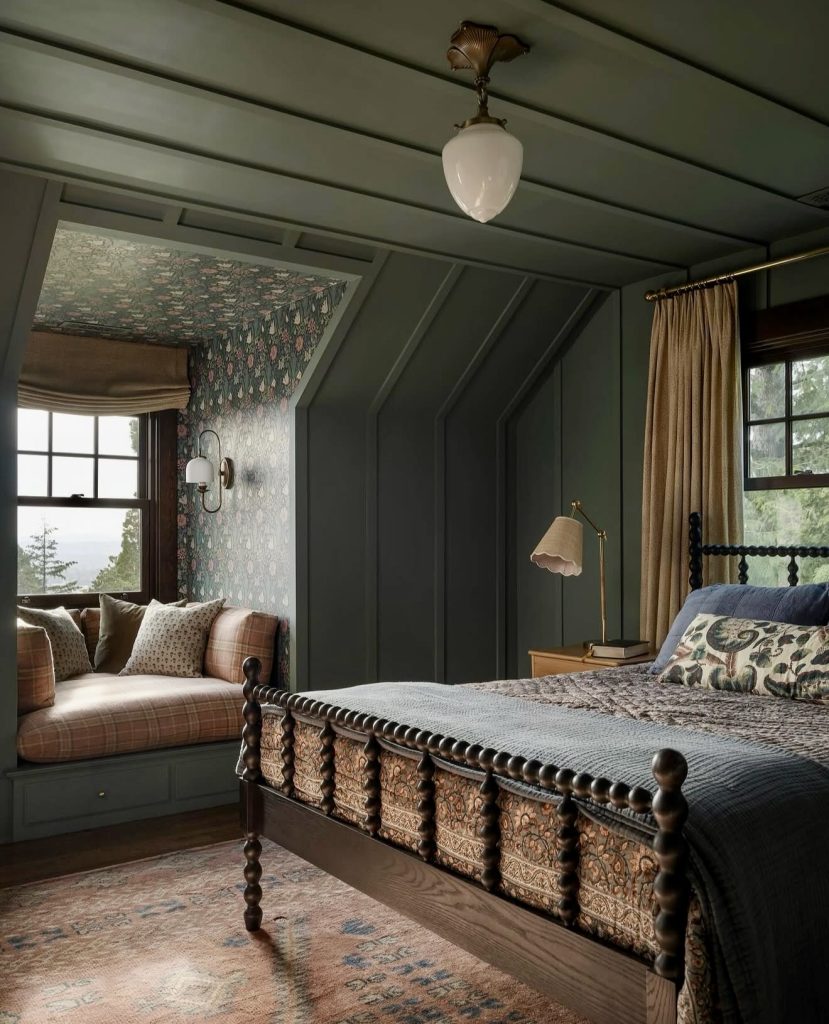 Bedroom with dark green paneling and vintage bed