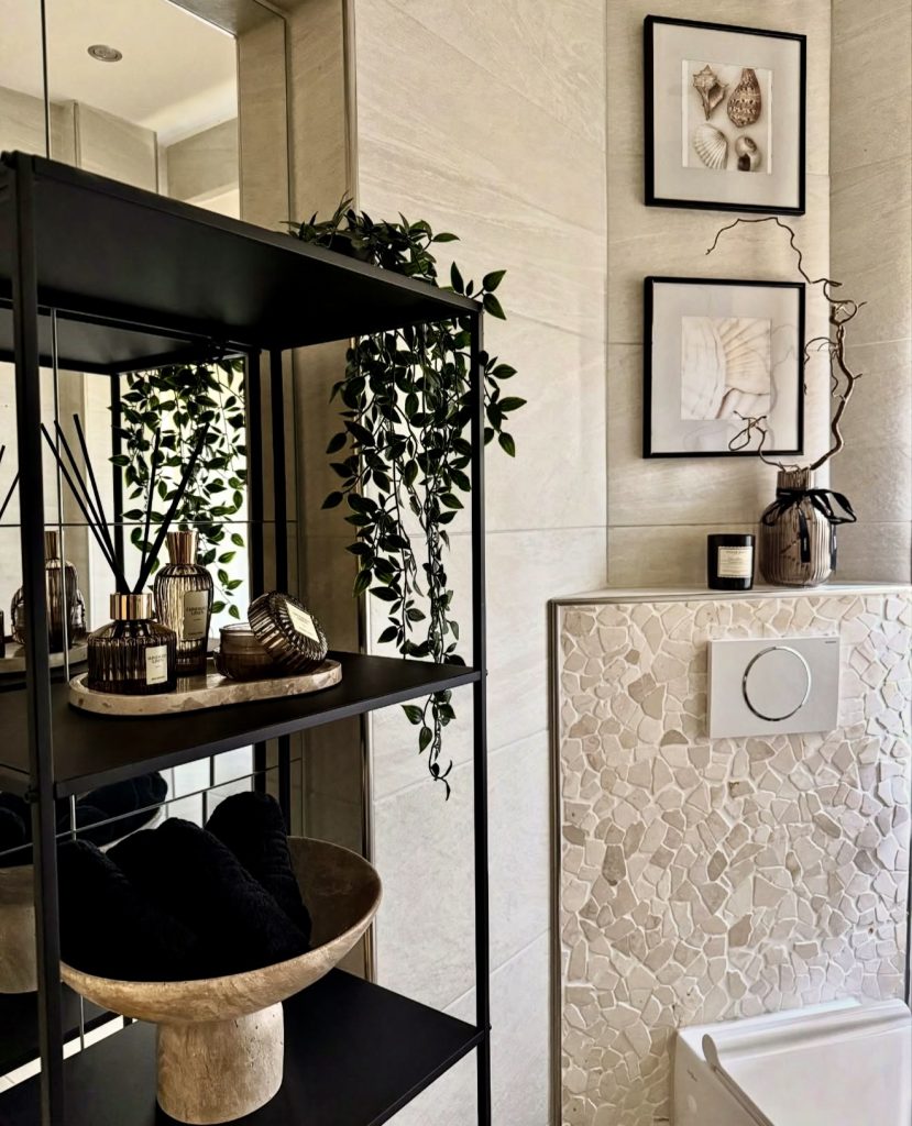 Guest bathroom with black shelving and mosaic tiles