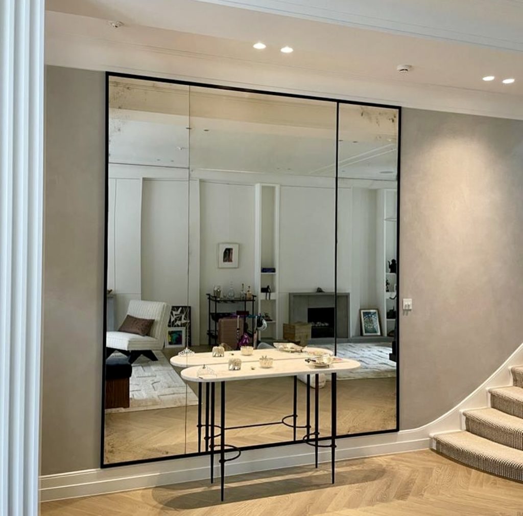 Large Mirrored Wall With Black Frame