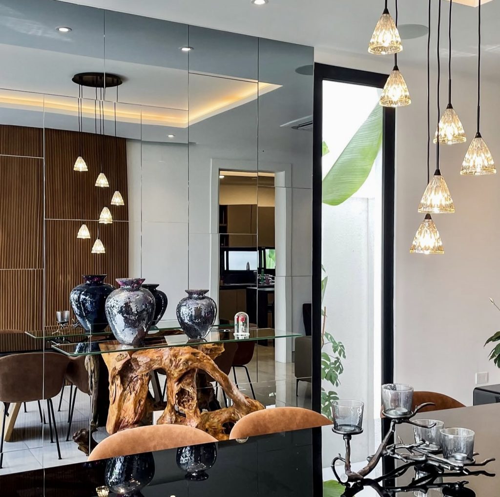 Modern Dining Space With Sleek Grid Mirrors