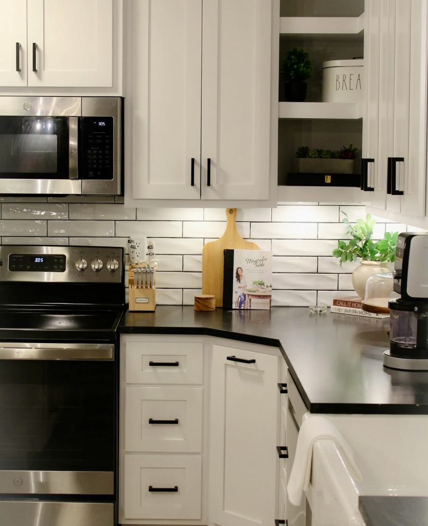 White cabinetry with black accents