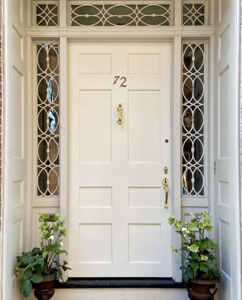 Crisp White Front Door on Brick Home