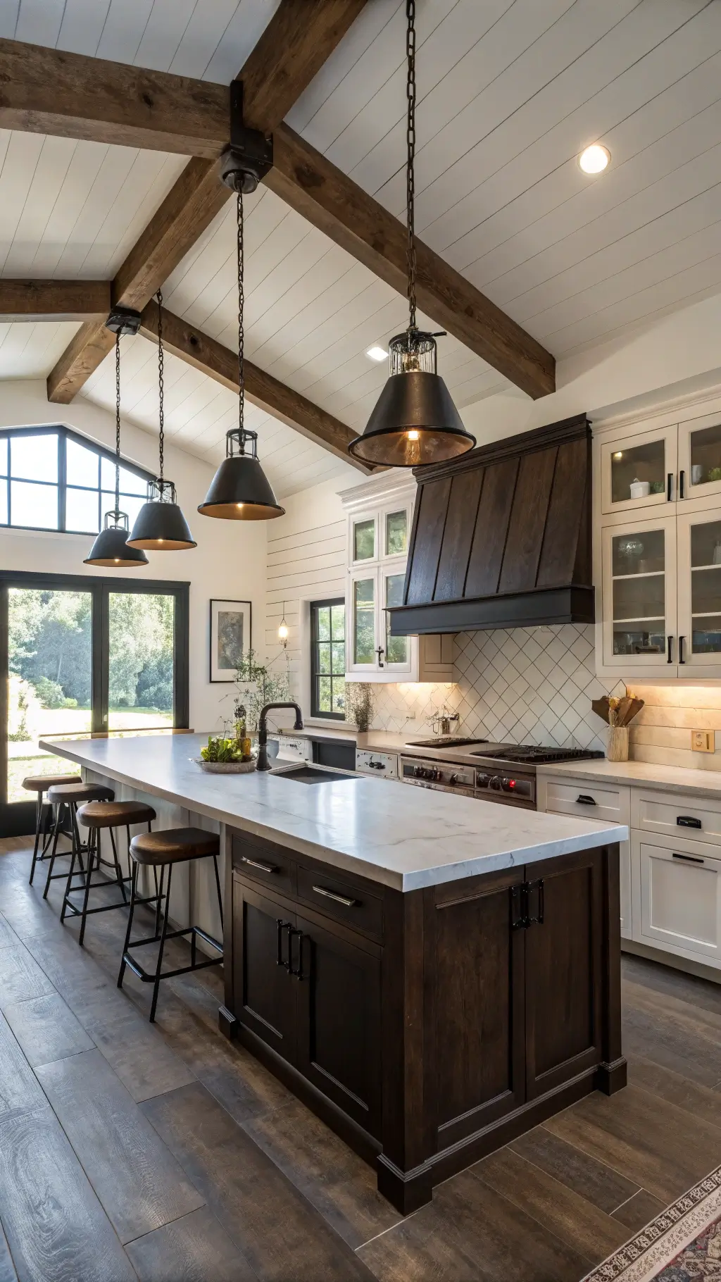 Elevated view of a 16x22ft modern farmhouse style kitchen featuring exposed beams, dark oak cabinets in espresso finish contrasted against white shiplap walls, butcher block and concrete composite countertops, accented with mixed metals and dappled afternoon light from French doors.