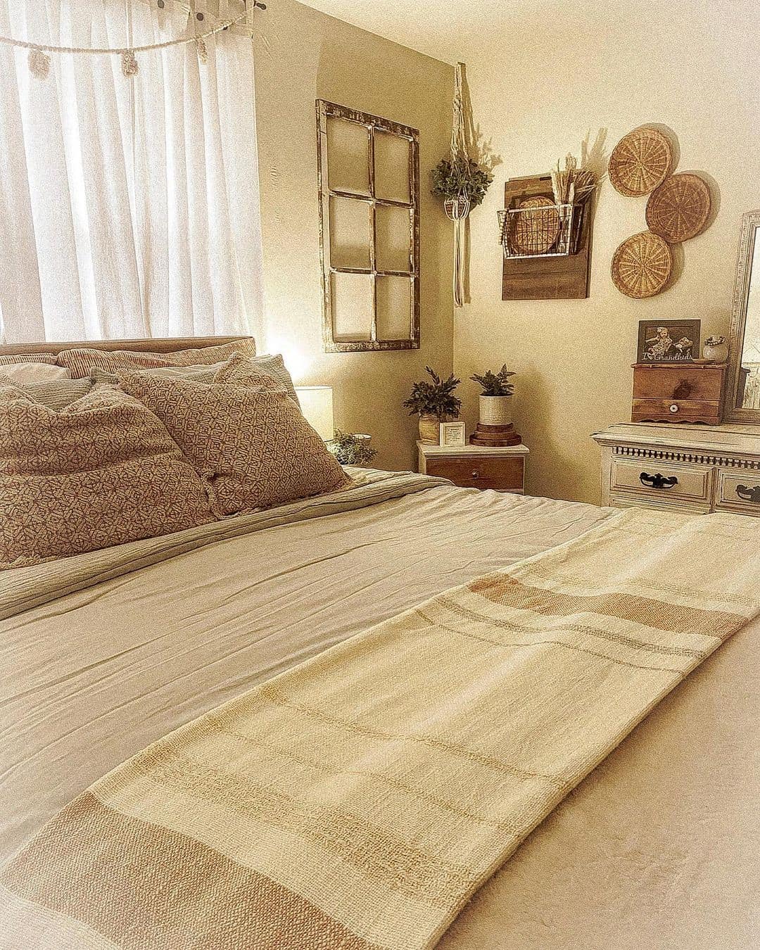 Soft Neutral Bohemian Bedroom with Textured Wall Hangings