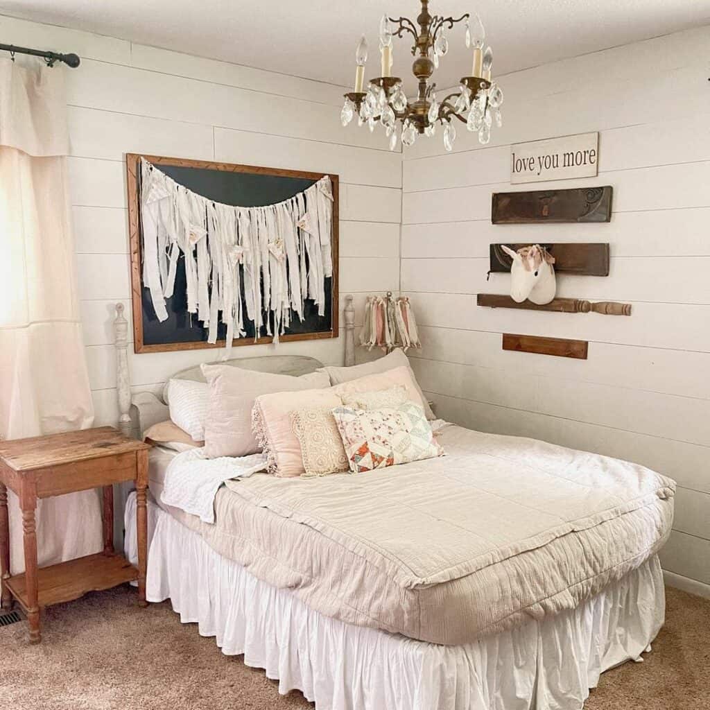 Rustic Farmhouse Bedroom with Vintage Bronze Chandelier