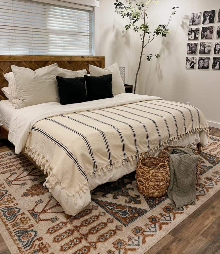 Bohemian Farmhouse Bedroom Featuring a Bold Geometric Rug