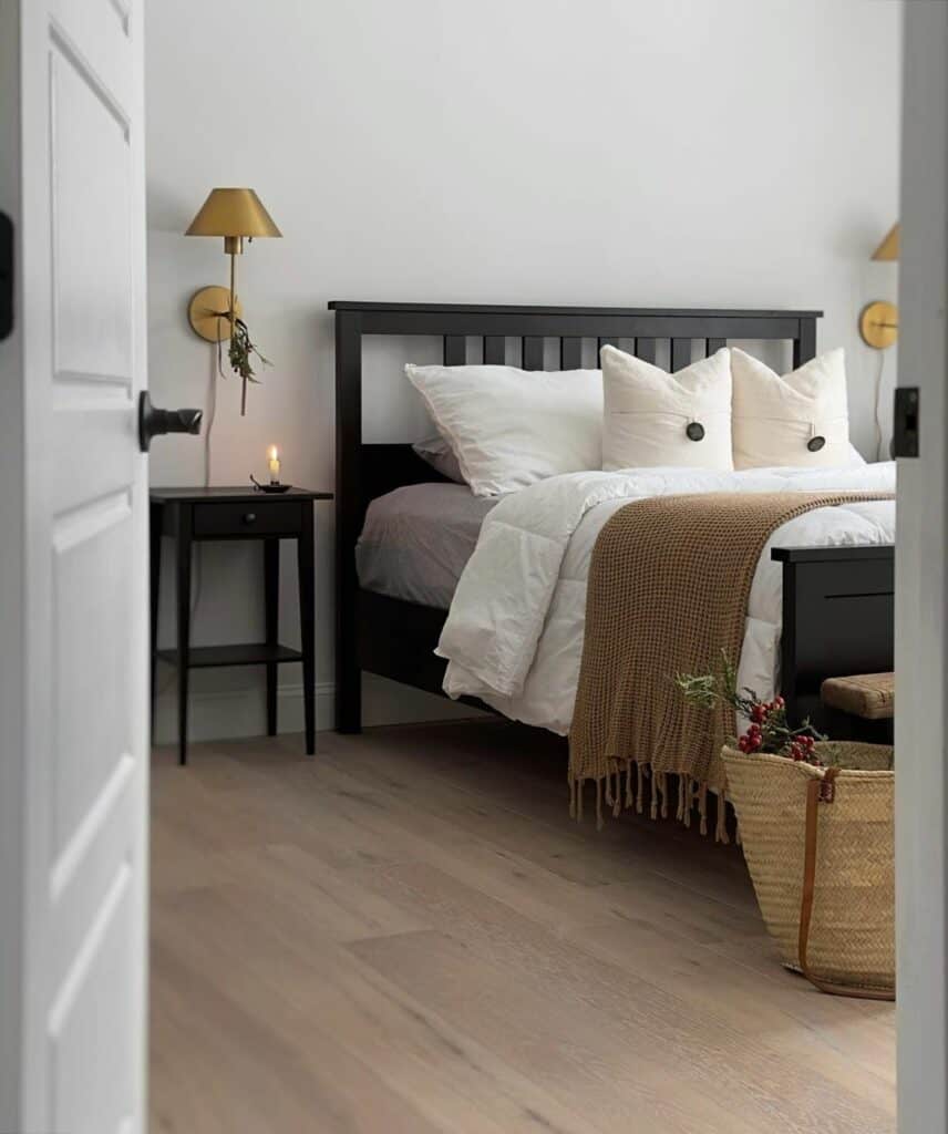 Elegant Fusion of Brass Sconces and Black Furniture