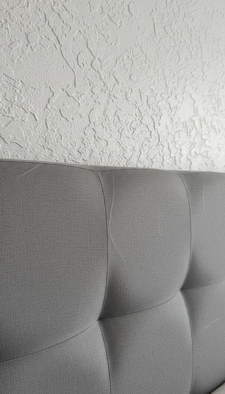 white and gray bedroom - Grounding the Space with Soft Textures - Gray headboard adds comfort and style