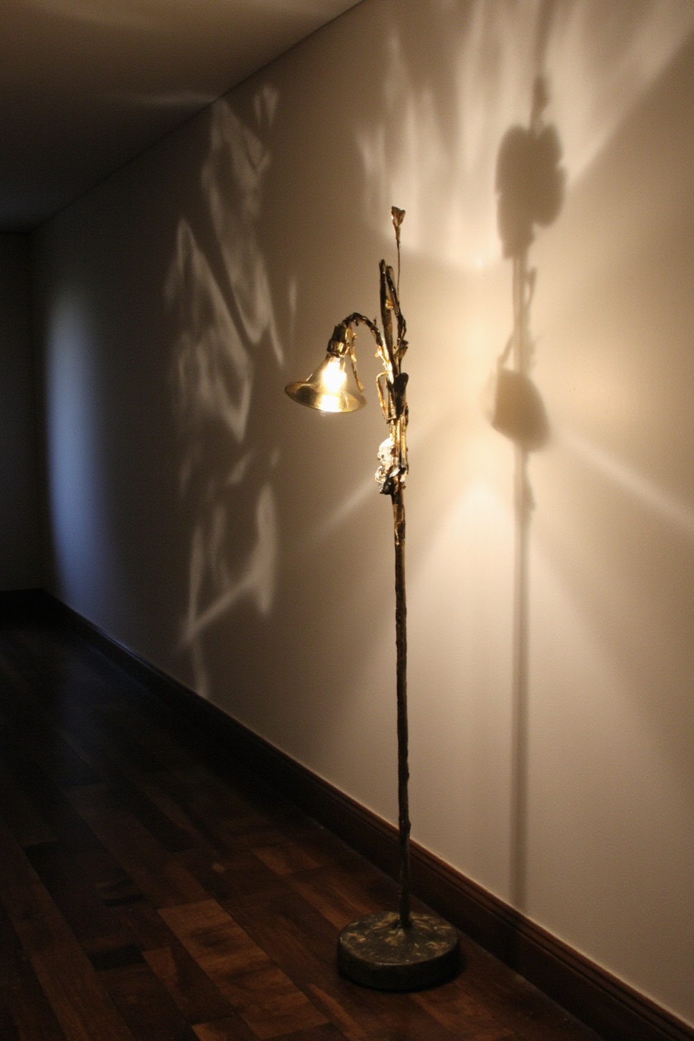 end of hallway decor - Sculptural Lighting - Abstract floor lamp with bronze base and amber light...