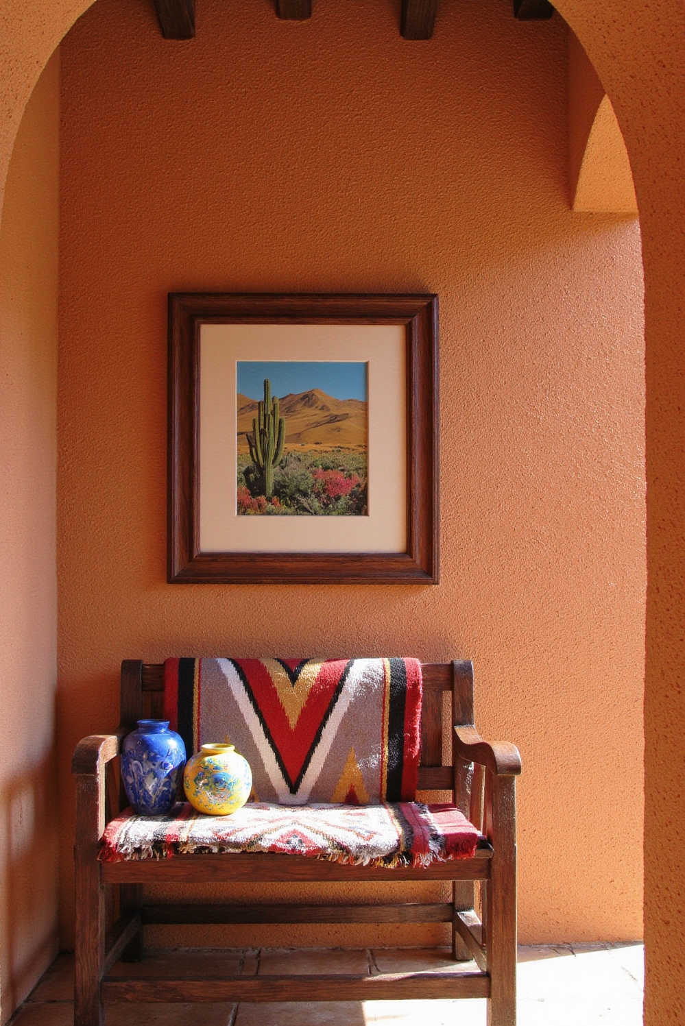 end of hallway decor - Southwestern Vignette - Terracotta walls, Navajo blanket, Talavera pottery...