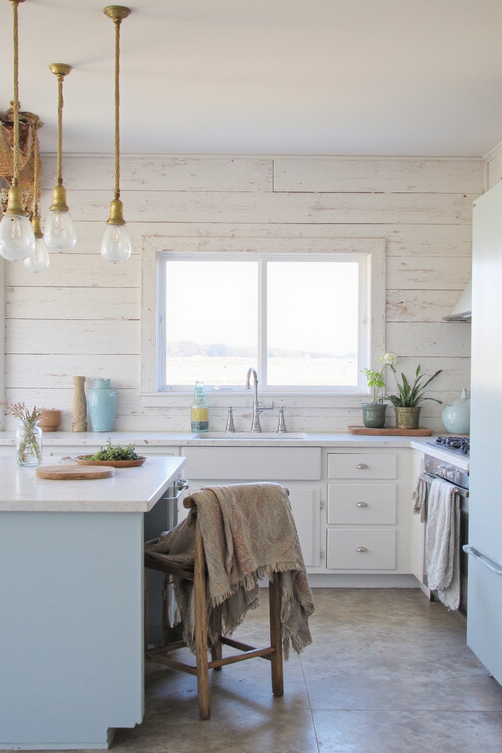 Industrial kitchen design - Coastal Industrial Kitchens - Whitewashed wood and brass lighting
