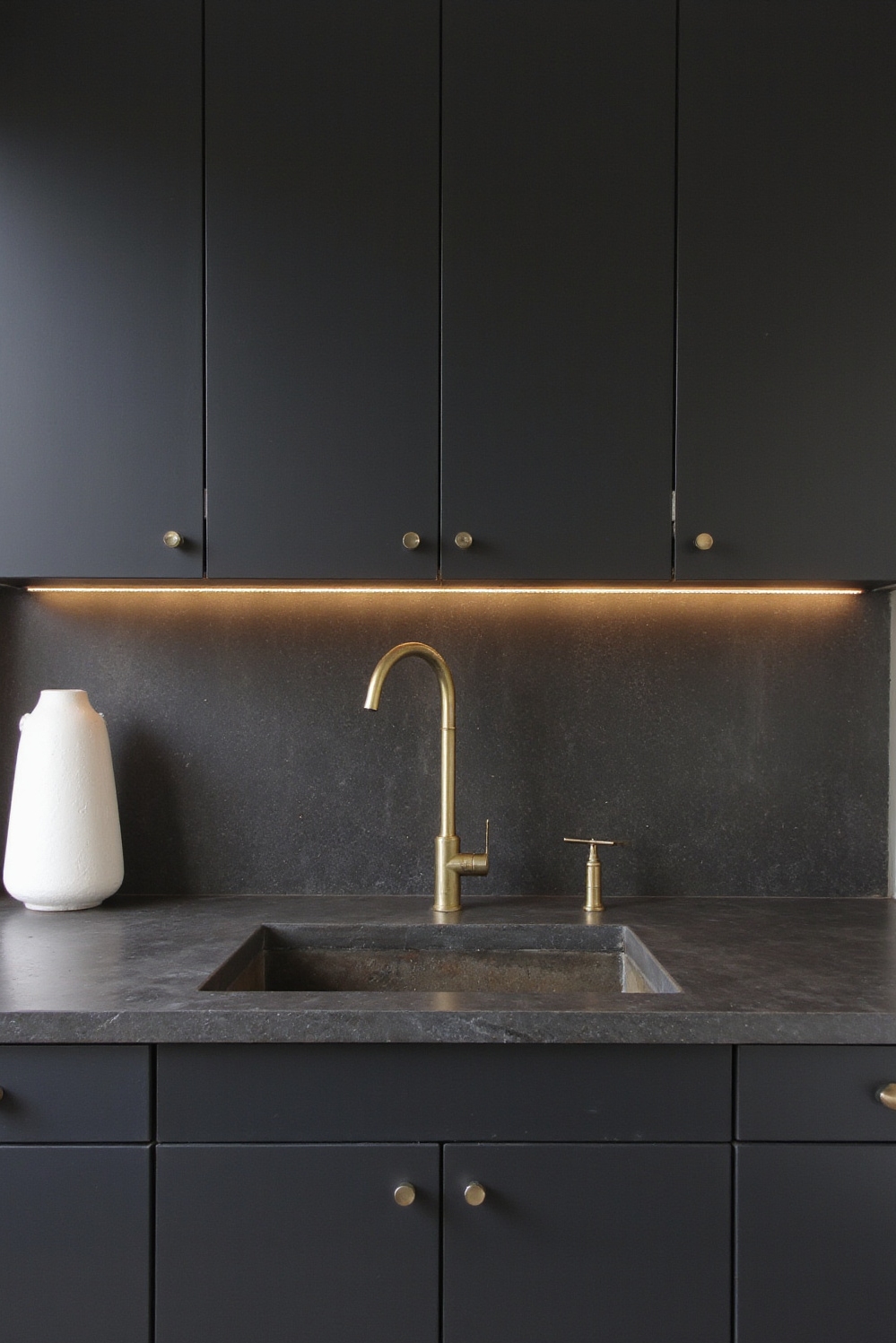 Industrial kitchen design - Minimalist Industrial Kitchen - Matte black cabinets and brass hardware