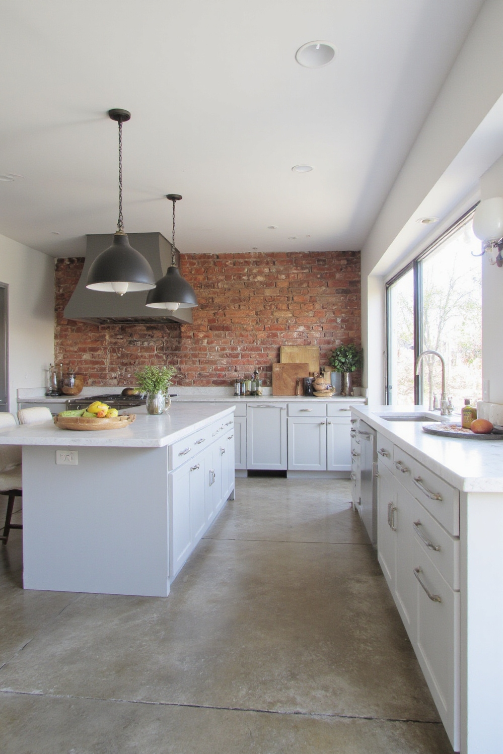 Industrial kitchen design - Refined Industrial Accents - Light grey cabinets and quartz countertops