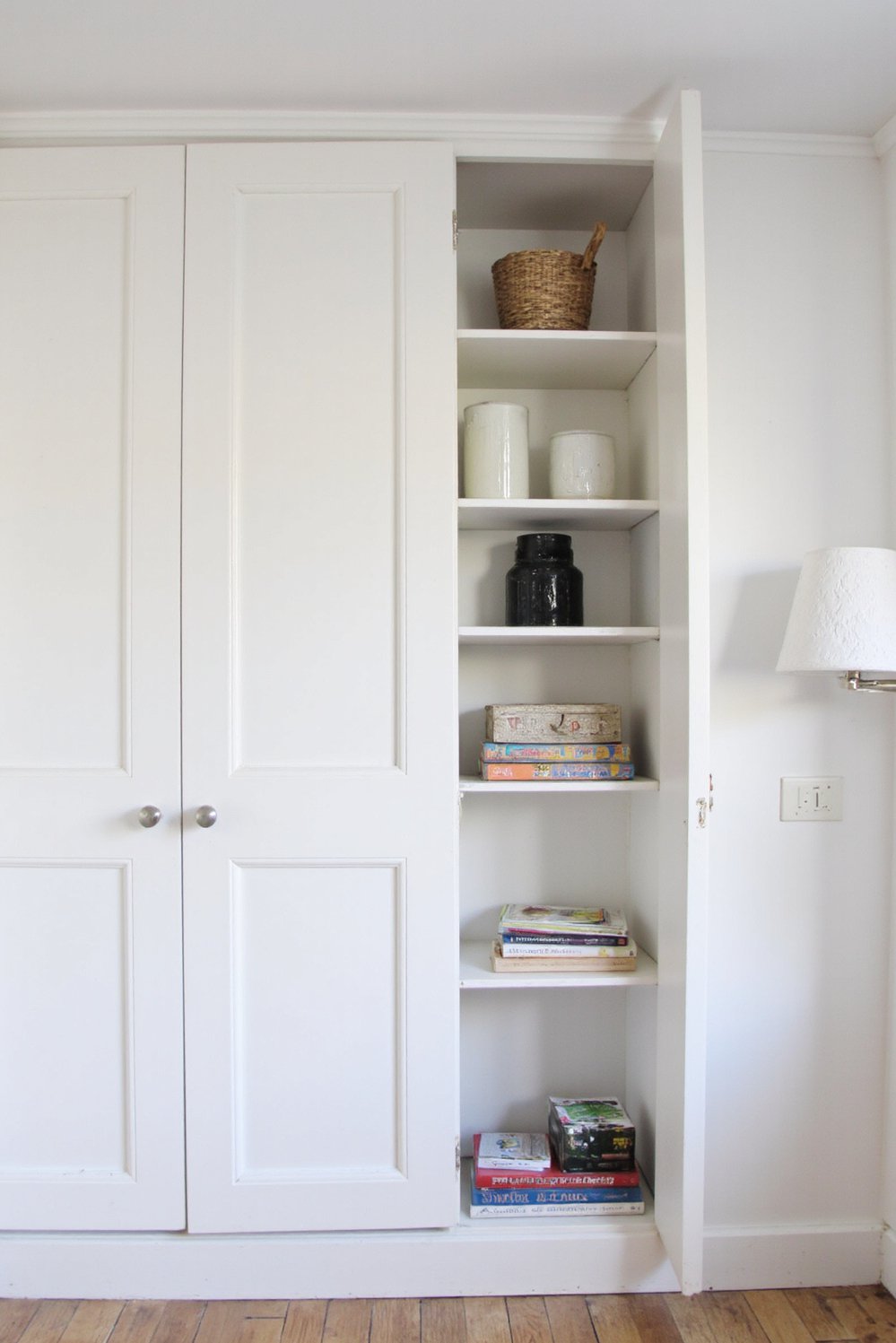 White bedroom decor ideas - Smart Storage Solutions: Maximizing Small White Bedrooms - White bedroom with built-in wardrobes