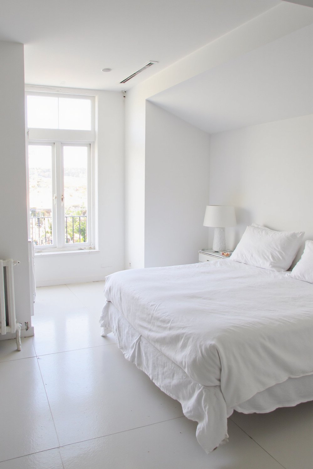 White bedroom decor ideas - Minimalist Geometry: Clean and Calm White Bedroom - White bedroom with geometric furniture