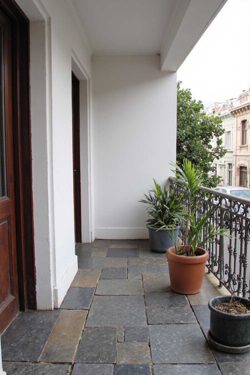 Balcony flooring ideas - Classic Appeal: Patterned Slate Flooring for Small Balconies - Add character with patterned slate flooring...