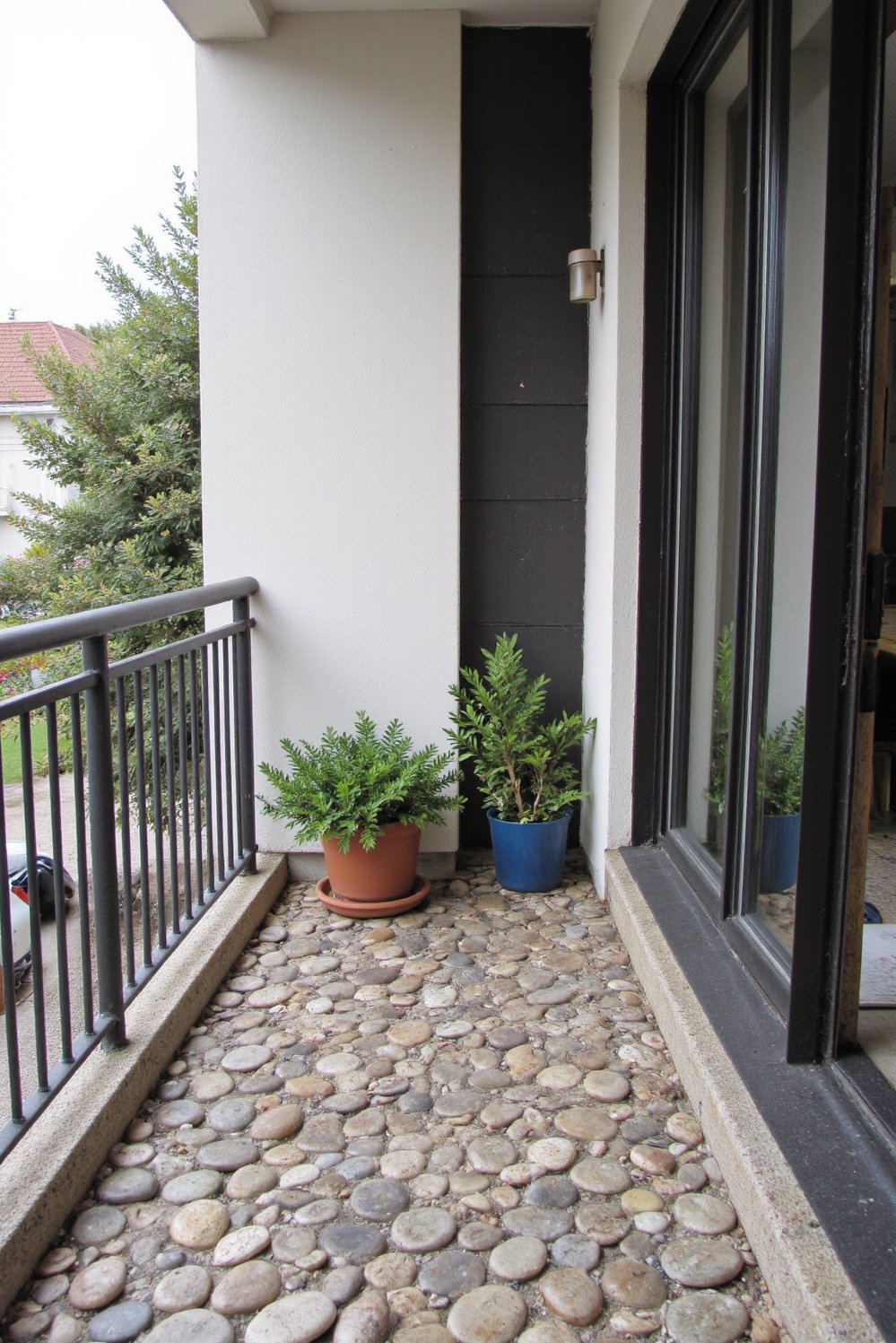 Balcony flooring ideas - Zen Ambiance: River Stone Flooring for a Spa-Like Balcony - Create a calming balcony with river stone flooring...