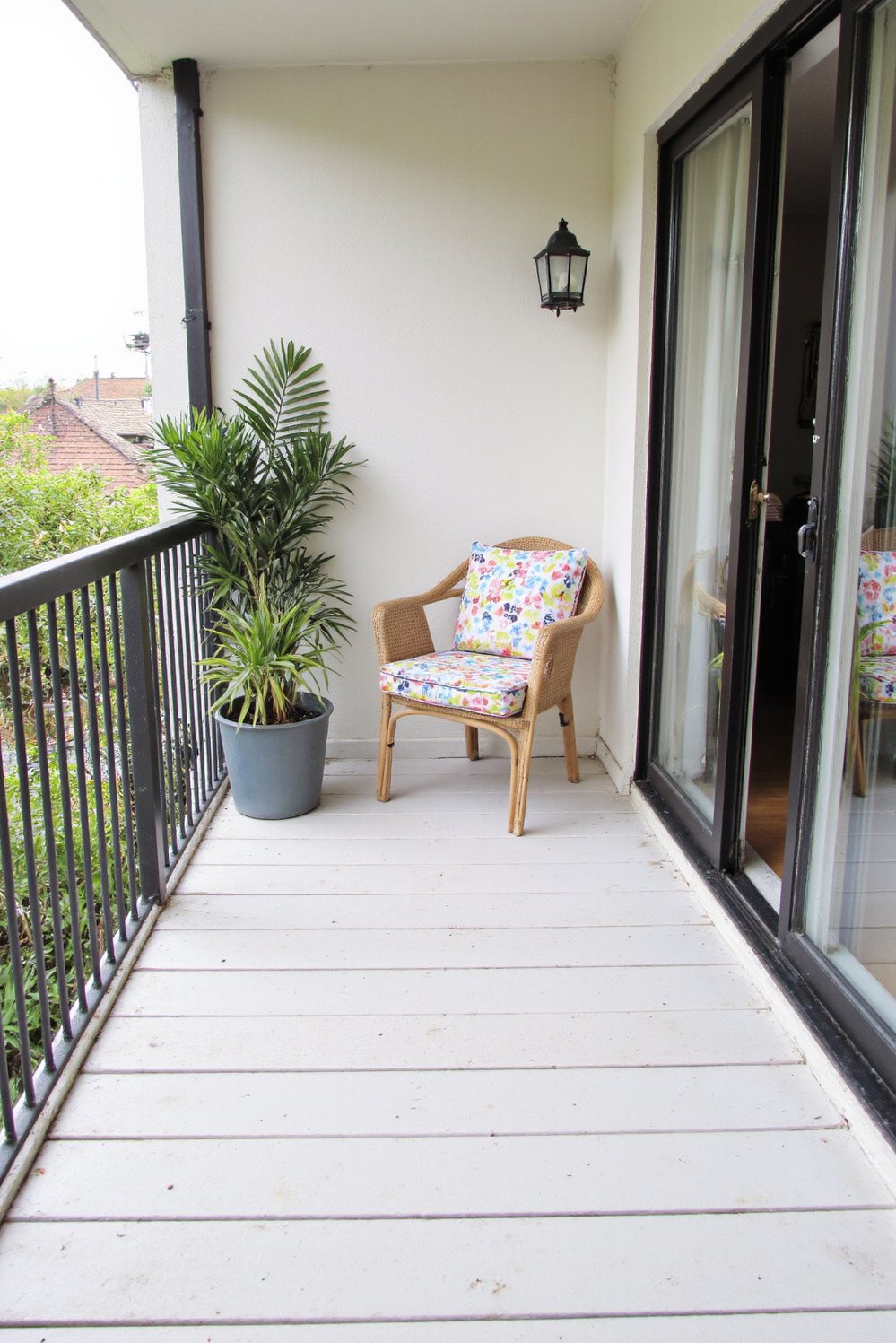 Balcony flooring ideas - Bright and Airy: White Painted Wood Planks for Small Balconies - Use white wood planks to brighten a small balcony...