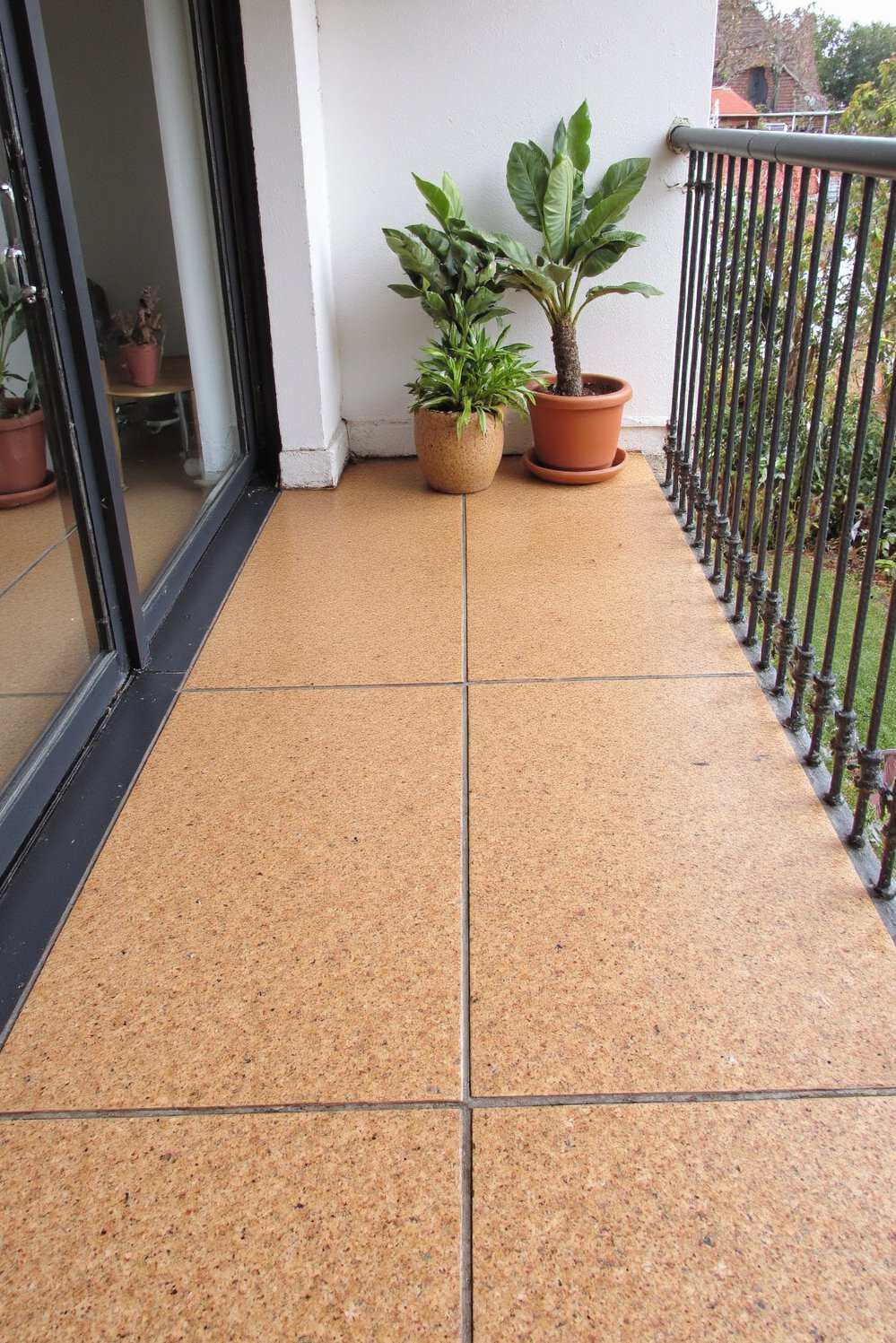 Balcony flooring ideas - Comfort and Sustainability: Cork Tiles for Cozy Balcony Floors - Use cork tiles for a warm, eco-friendly balcony floor...
